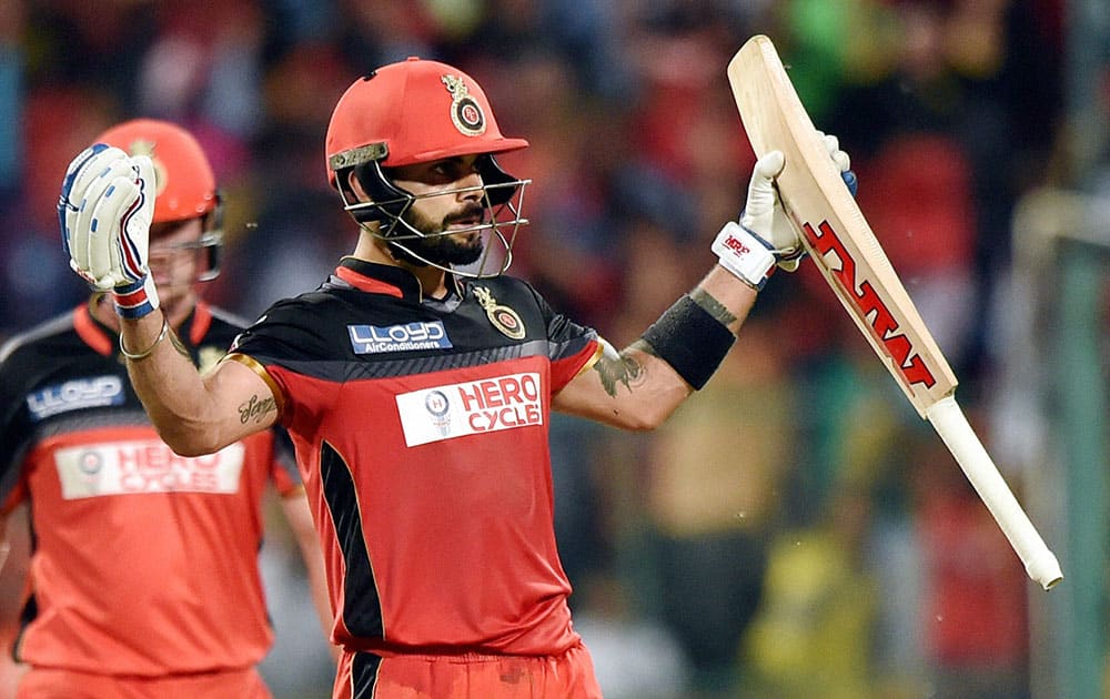 Royal Challengers Bangalores Virat Kohli celebrates his century during the IPL 2016 match against Rising Pune Supergiants in Bengaluru.