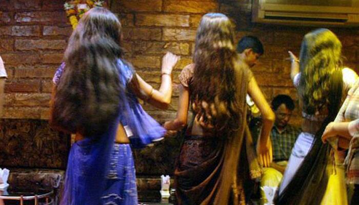 Girls performing striptease at upscale bar in Bengaluru found by police, many arrested