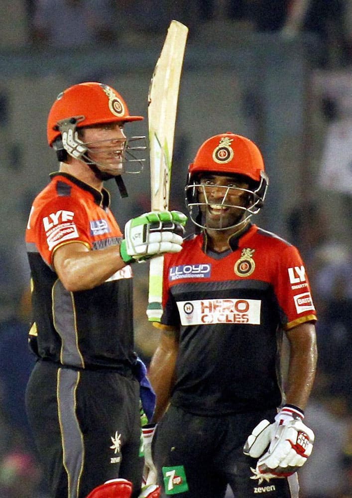 AB De Villiers of Royal Challengers Banglore celebrates his half century during an IPL match against Kings XI Punjab in Mohali.