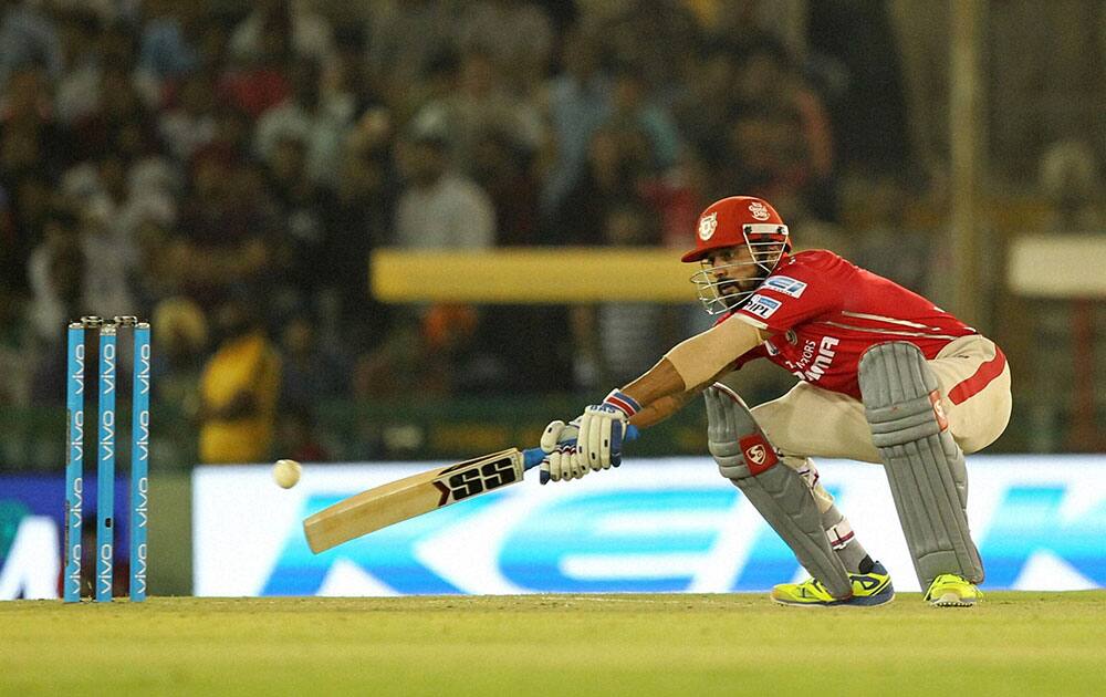 Murali Vijay captain of Kings XI Punjab plays a shot during an IPL match against Royal Challengers Bangalore in Mohali.