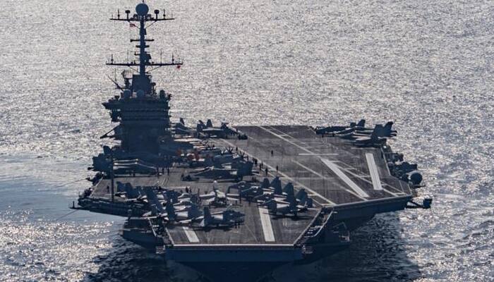US warship sail through disputed South China Sea; irks Beijing