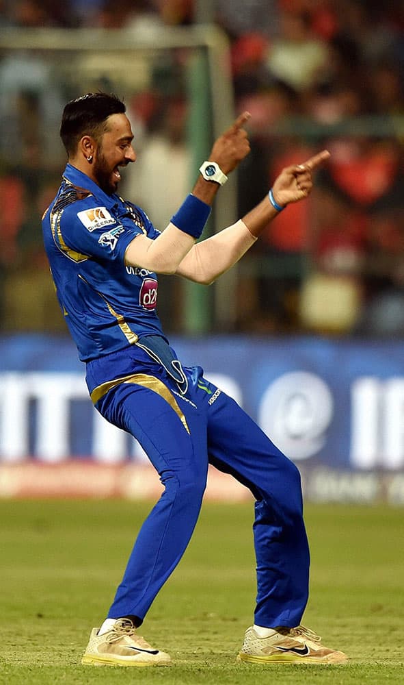 Mumbai Indians bowler Krunal Pandya celebrate the wicket of AB De Villiers during IPL 2016 match against Royal Challengers Bangalore at Chinnaswamy stadium in Bengaluru.