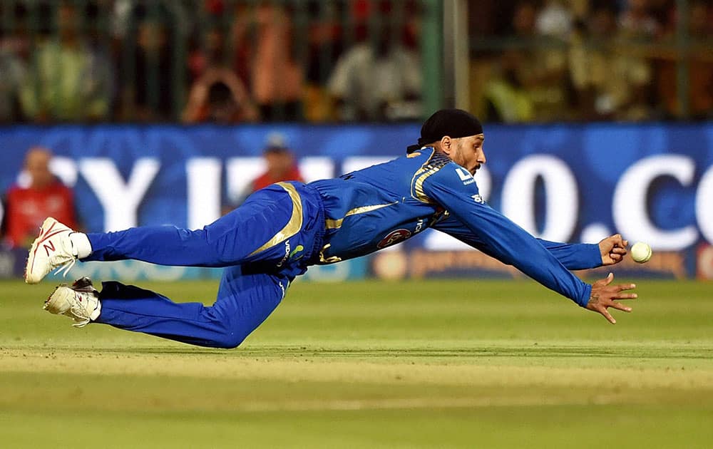 Mumbai Indians bowler Harbhajan Singh drops the catch of AB De Villiers during IPL 2016 match against Royal Challengers Bangalore at Chinnaswamy stadium in Bengaluru.