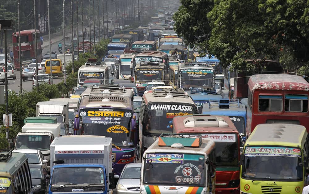 Despite a call for day-long nationwide strike by Bangladesh's largest Islamist political party, Jamaat-e-Islami, vehicles are seen stuck in a traffic jam in Dhaka, Bangladesh.