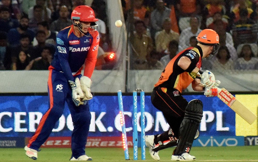 Sunrisers Hyderabad captain David Warner gets clean bowled against Delhi Daredevils during IPL cricket match in Hyderabad.