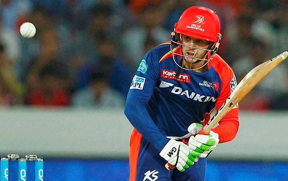 Delhi Daredevils batsman Quinton de Kock plays a shot against Sunrisers Hyderabad during an IPL cricket match at Uppal Stadium in Hyderabad.