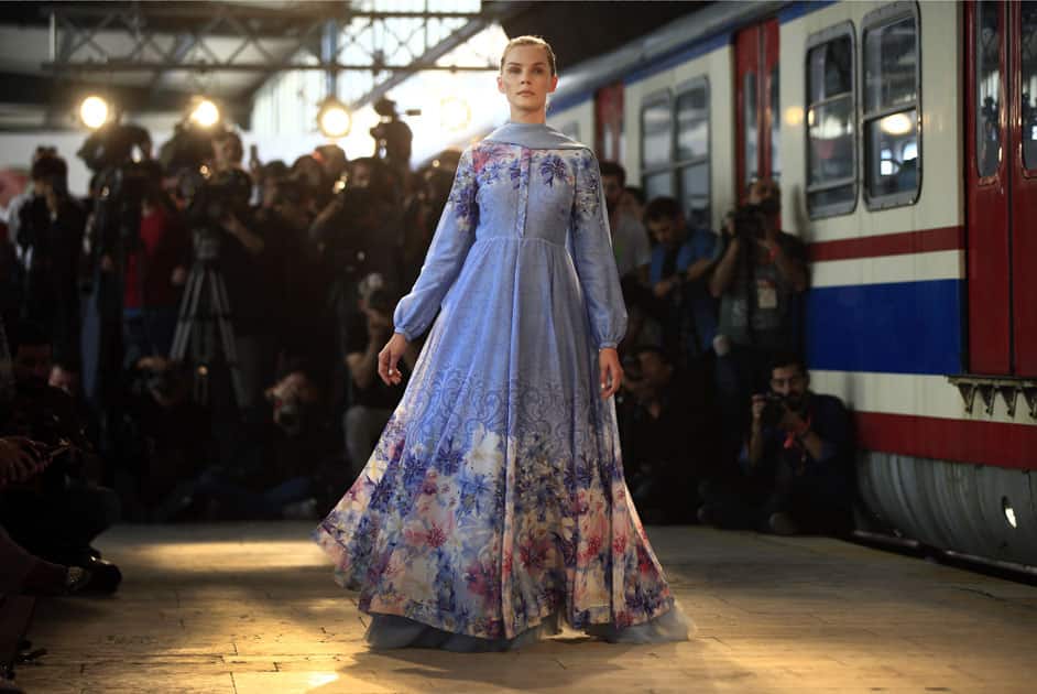 A models hits the catwalk of a fashion show during the International Modest Fashion Week, in Istanbul.