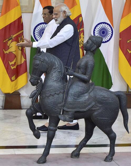 Prime Minister Narendra Modi with Sri Lankan President Maithripala Sirisena before their meeting in New Delhi.