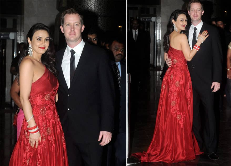 Actress Preity Zinta and her husband Gene Goodenough pose for media during their Wedding Reception in Mumbai.