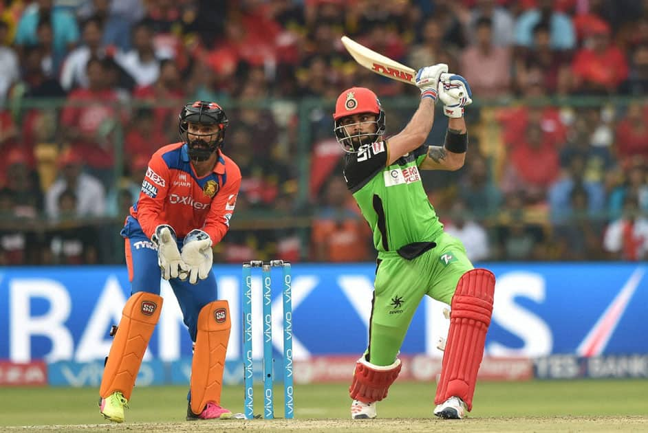 Royal Challengers Bangalore Virat Kohli plays a shot during the IPL T20 match against Gujarat Lions in Bengaluru.