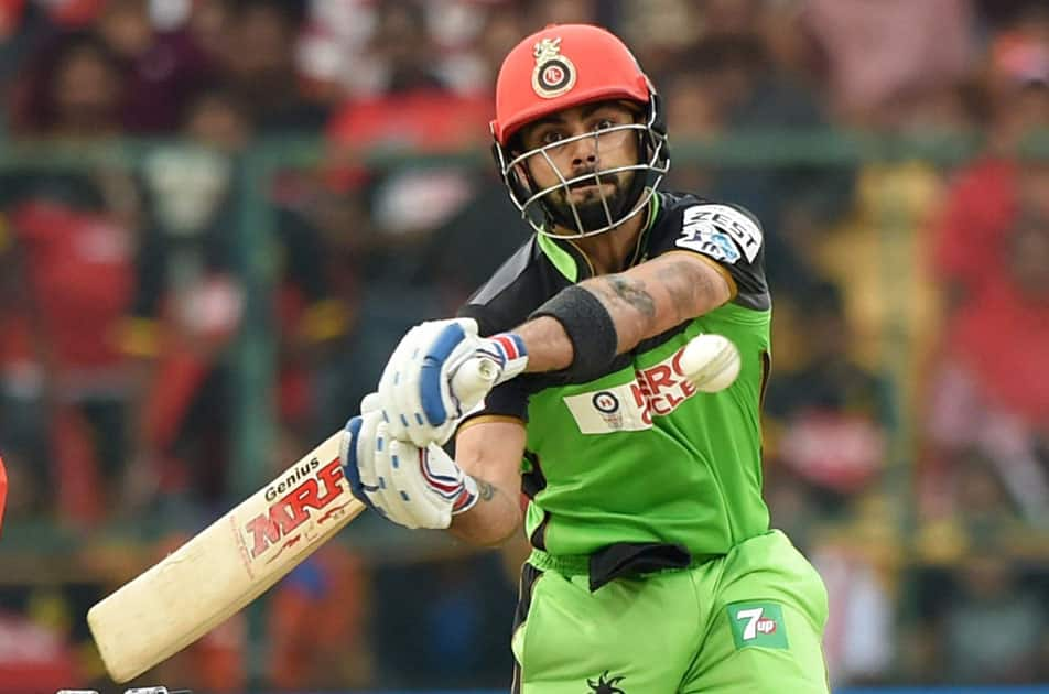 Royal Challengers Bangalore Virat Kohli plays a shot during the IPL T20 match against Gujarat Lions in Bengaluru.