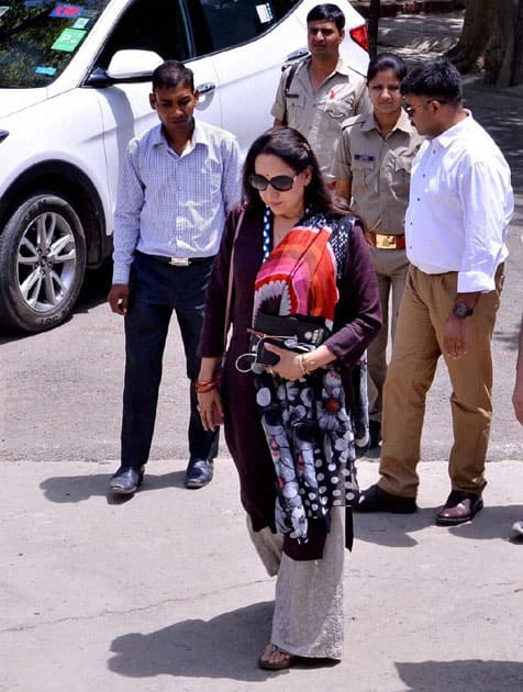 Actor and BJP MP from Mathura Hema Malini on her way to meet the District Magistrate to discuss issues related to the development of her constituency, in Mathura.