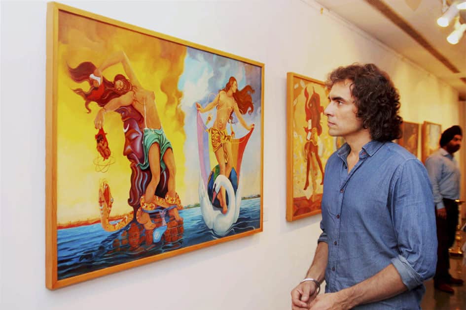 Film director Imtiaz Ali viewing some works by B M Anand on display at the India International Centre, 30 years after his death.