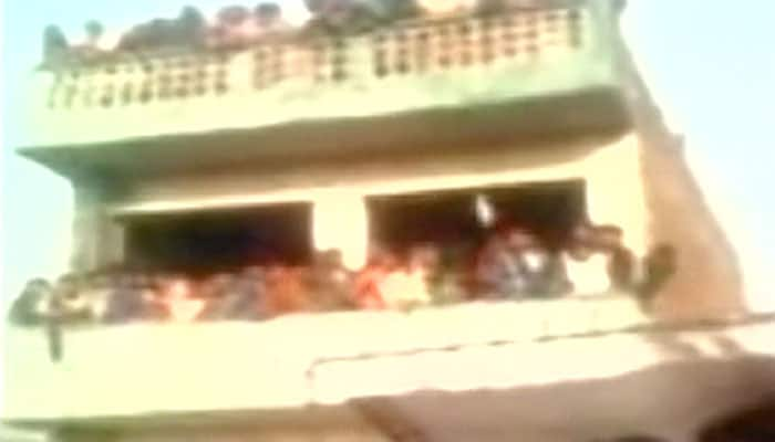 Shocking: Caught on cam as over-crowded balcony collapses in Kanpur - Watch