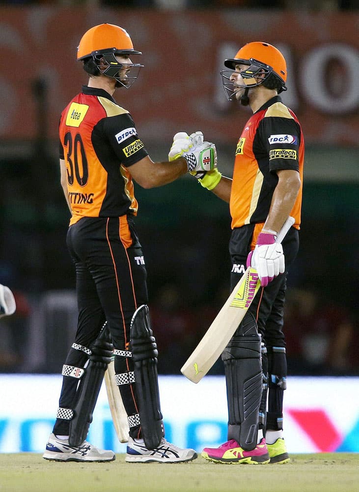 Ben Cutting of Sunrisers Hyderabad and Yuvraj Singh of Sunrisers Hyderabad celebrate as Sunrisers Hyderabad beat Kings XI Punjab by 7 wickets an IPL match in Mohali.