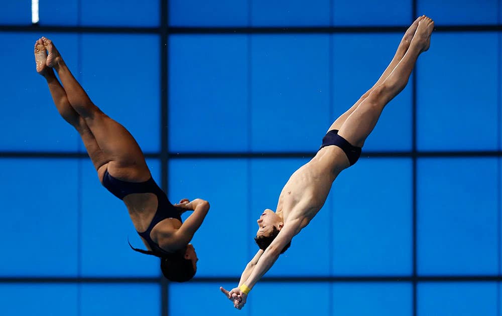 Romenias Yulia Timoshinina and Nikita Shleikher during the Diving Mixed 10m Synchro Final competition at the European Aquatics Championships.