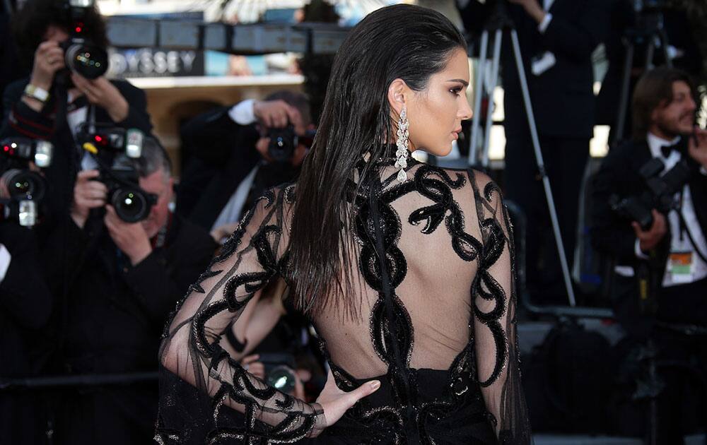 Model Kendall Jenner poses for photographers upon arrival at the screening of the film Mal De Pierres at the 69th international film festival, Cannes.