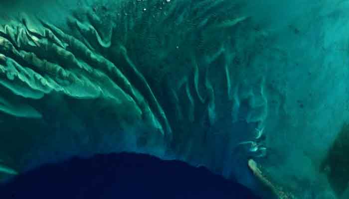 Breathtaking image of Bahamas coral reefs captured from space - See pic!
