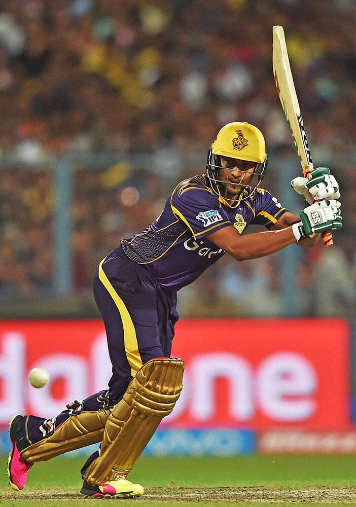 KKR batsman Shakib Al Hasan plays a shot during an IPL match against RCB at Eden Garden in Kolkata.