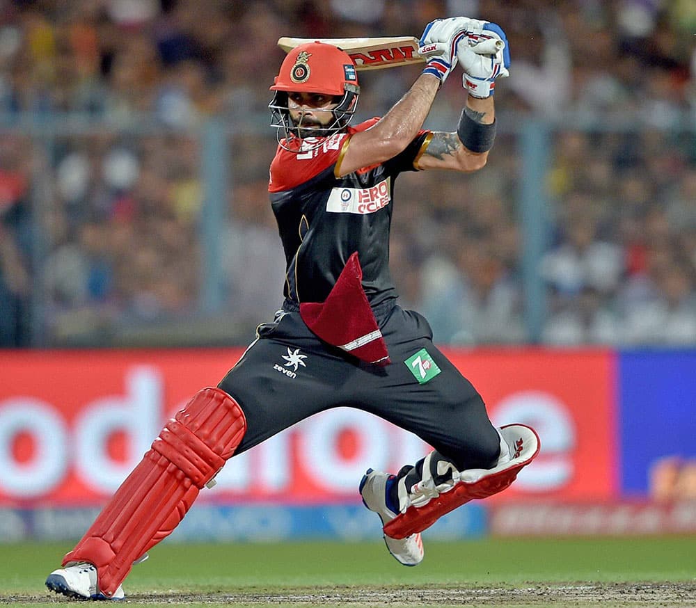 RCB batsman batsman Virat Kohli plays a shot during an IPL match against KKR at Eden Garden in Kolkata.