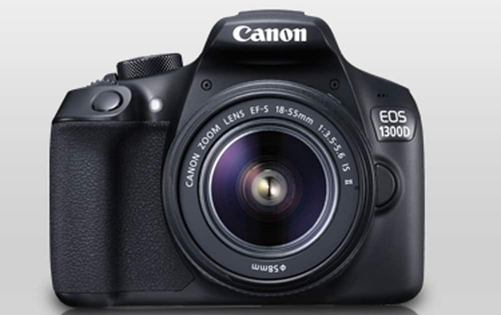 Canon EOS 1300D priced at Rs 25,990 (Flipkart). It comes with 18MP 22.3 x 14.9 mm, APS-C CMOS sensor,Fixed 3? 920k-dot display,100-6400 ISO, battery-500 shots.
