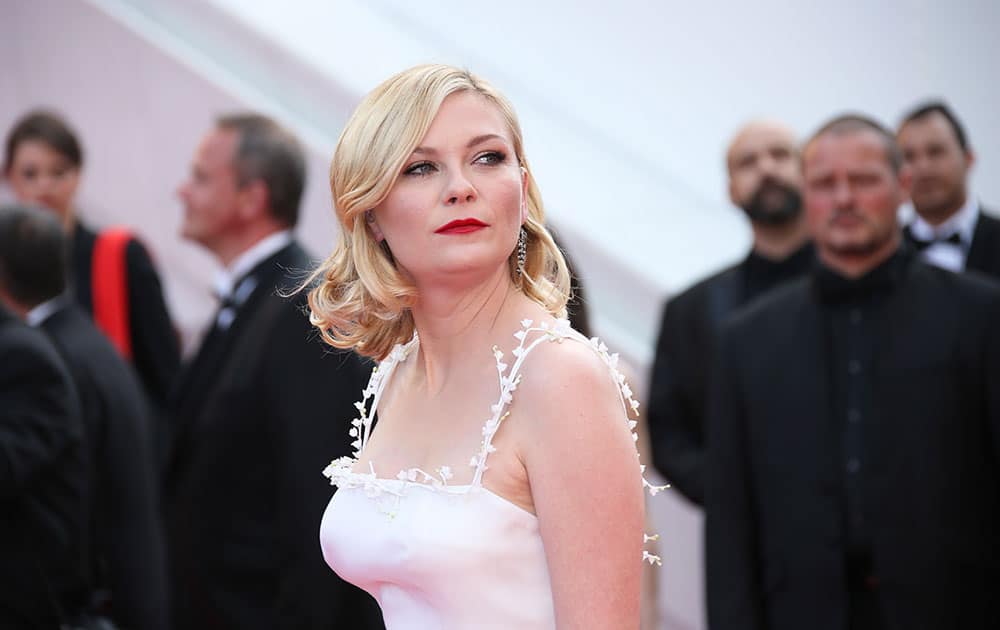 Jury member Kirsten Dunst poses for photographers upon arrival at the screening of the film Loving at the 69th international film festival, Cannes, southern France.