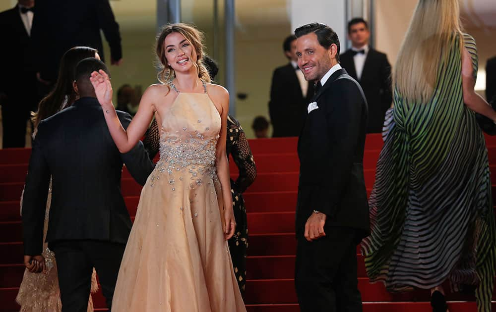 Actress Ana De Armas and actor Edgar Ramirez pose for photographers upon arrival at the screening of the film Hands of Stone at the 69th international film festival, Cannes, southern France.