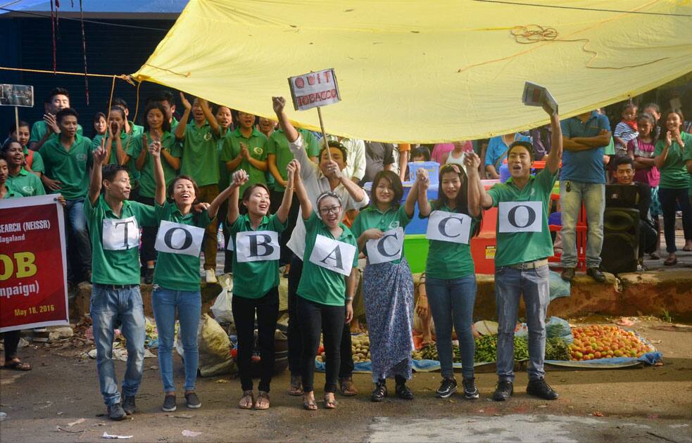 Students of North East Institute of Social Science and Research at a flash mob show against Tobacco in collaboration with National Tobacco Control Programme at Dimapur.
