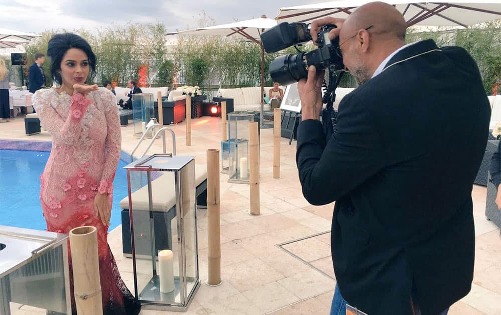 Mallika Sherawat ‏@mallikasherawat  :- Striking a pose for the camera , @UNICEF #Cannes2016 #alexismabille -twitter