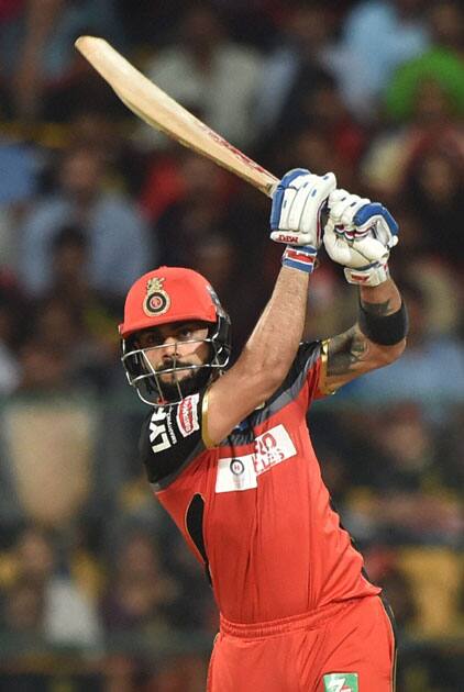 Royal Challengers Bangalores Virat Kohli plays a shot during an IPL match against Kings XI Punjab at Chinnaswamy Stadium in Bengaluru.