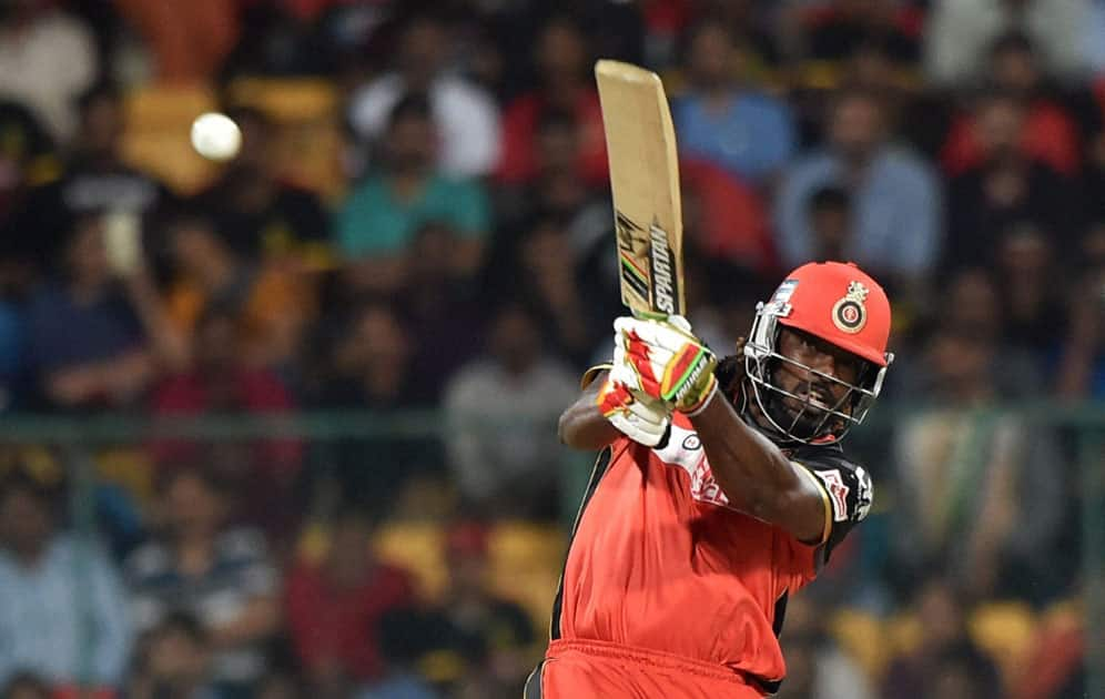 Royal Challengers Bangalores Chris Gayle plays a shot during an IPL match against Kings XI Punjab at Chinnaswamy Stadium in Bengaluru.
