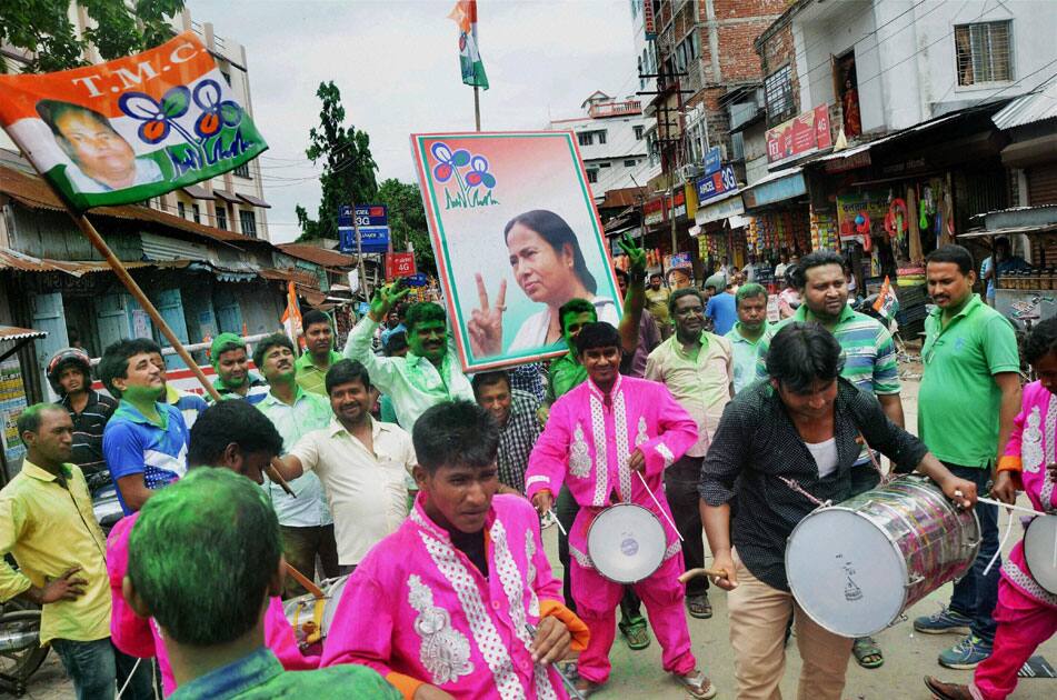 Trinamool Congress supporters celebrate the partys win in West Bengal assembly elections, in Tripuras Agartala.