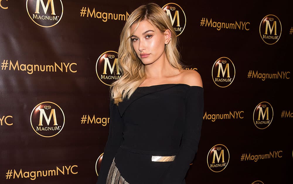 Model Hailey Baldwin poses at the opening of MAGNUM New York, the first US storefront for MAGNUM Ice Cream.