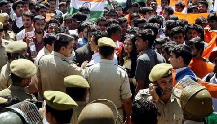 J&amp;K: Police fire tear gas shells as students indulge in protest near Degree College Ganderbal