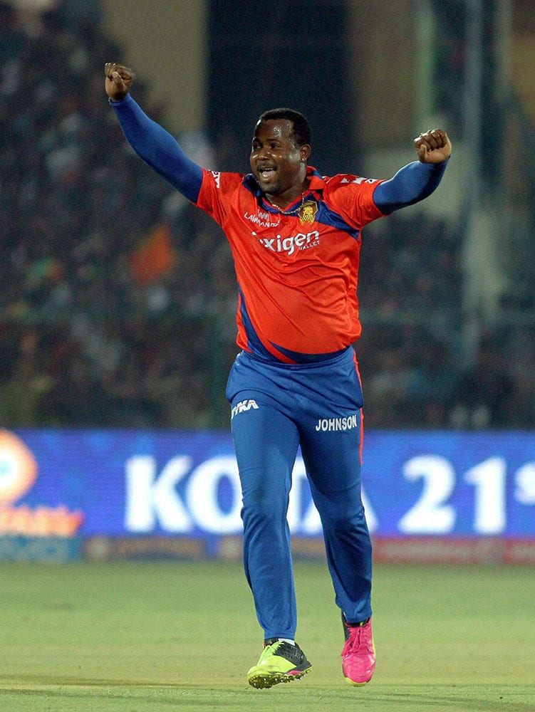 Gujarat Lions bowler Dwayne Smith celebrates after taking wicket of Sakib al Hasan of Kolkata Knight Riders during an IPL 2016 match at Green Park Stadium in Kanpur.