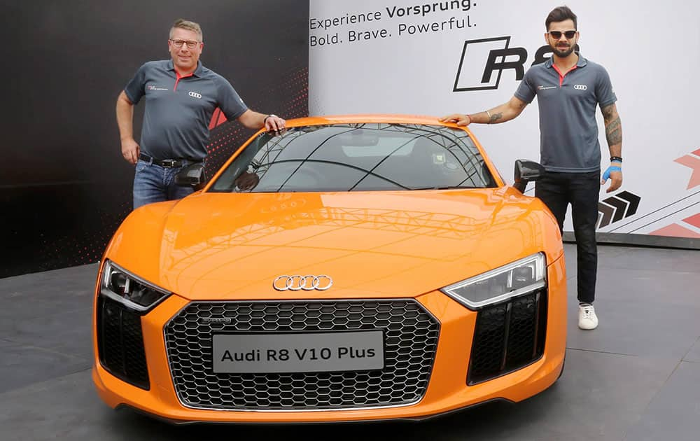 Cricketer Virat Kohli with Joe King, Head Audi India at the launch of the next generation Audi R8 V10 Plus at Taneja Aerospace and Aviation Limited at Denkanikotta Taluk, Belagondapalli near Bengaluru.
