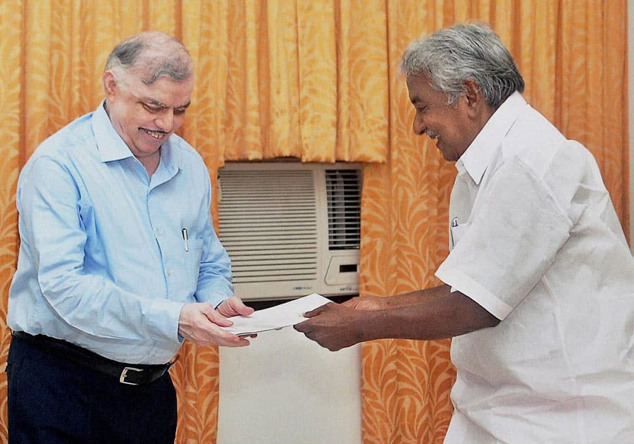 Kerala Chief Minister Oommen Chandy submitting his resignation to Governor P Sathasivam, following the defeat of Congress-led UDF in the Assembly elections in Thiruvananthapuram, Kerala.
