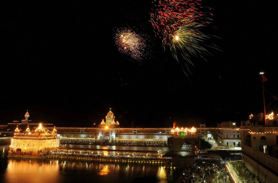 Fireworks light up at the Golden Temple during the 537th birth anniversary of the Third Sikh Guru Amar Das ji, in Amritsar.