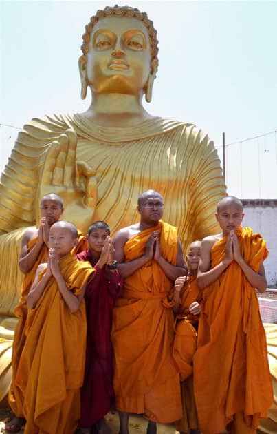 Buddhist monks offering prayers on the occasion of Buddha Jayanti in Bhopal.

