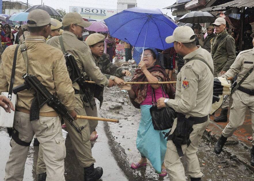 Police preventing protesters from proceeding towards Chief Ministers bungalow, demanding implementation of inner line permit system in Manipur, in Imphal.
