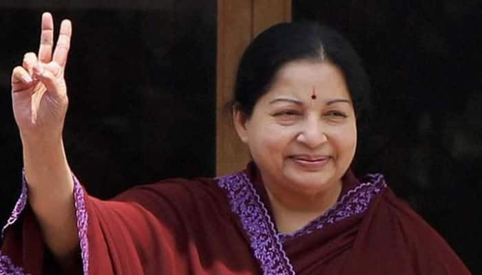 Jayalalithaa meets TN governor, stakes claim; swearing-in on May 23