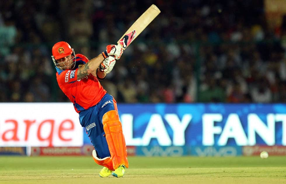 Gujarat Lions player Brendon McCullum plays a shot during an IPL match against Mumbai Indians at Green Park in Kanpur.