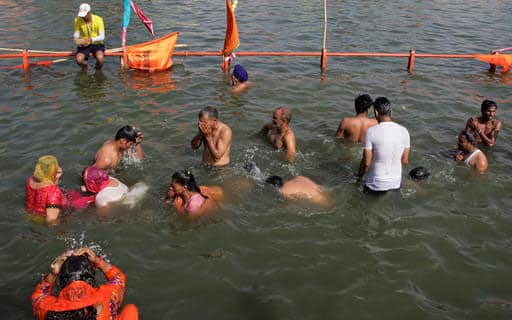 Hindu devotees take ritual dip on the last and third 'shahi snaan', or royal bath, in the River Shipra during the month long Kumbh festival at Ujjain in central Madhya Pradesh state, India.