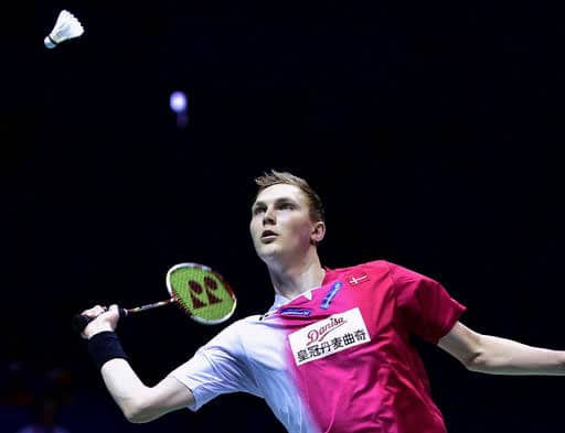 Viktor Axelsen of Denmark prepares to return a shot against Tommy Sugiarto of Indonesia in their men's singles final group match in the Thomas Cup in Kunshan in east China's Jiangsu province.