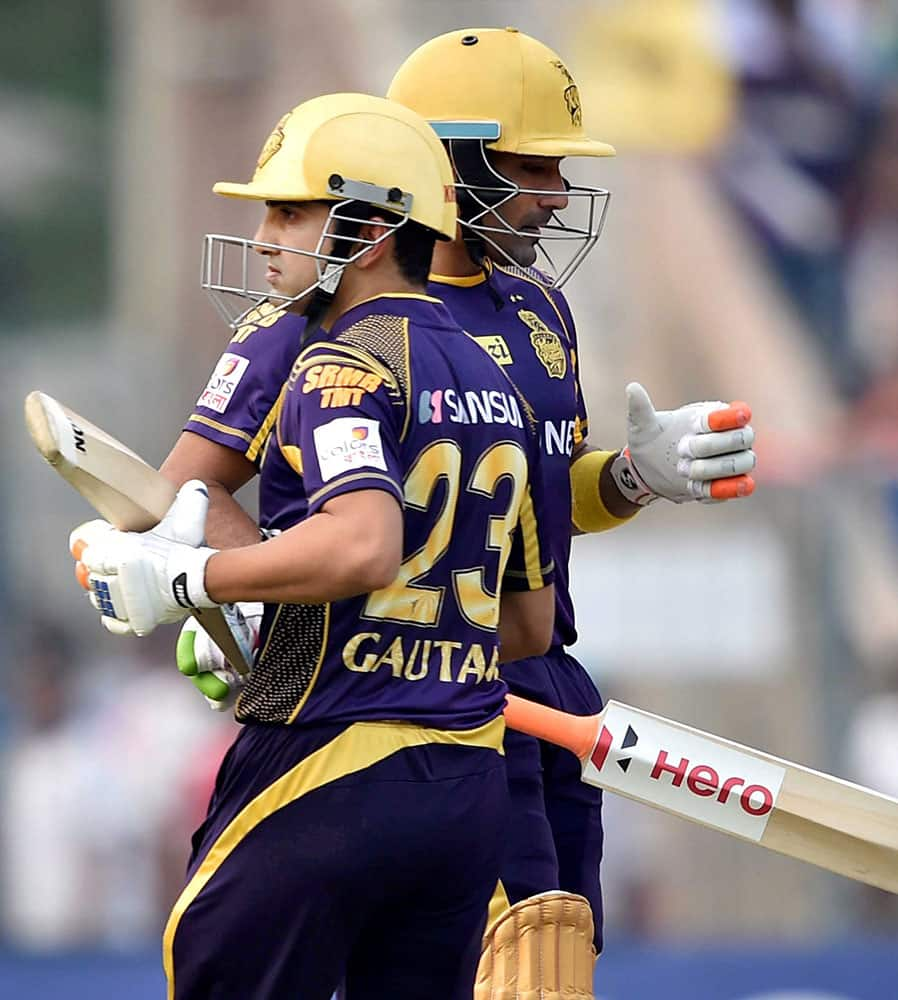 KKR batsmen Gautam Gambhir and Robin Uthappa cross each other to complete singles during IPL Match against SRH in Kolkata.