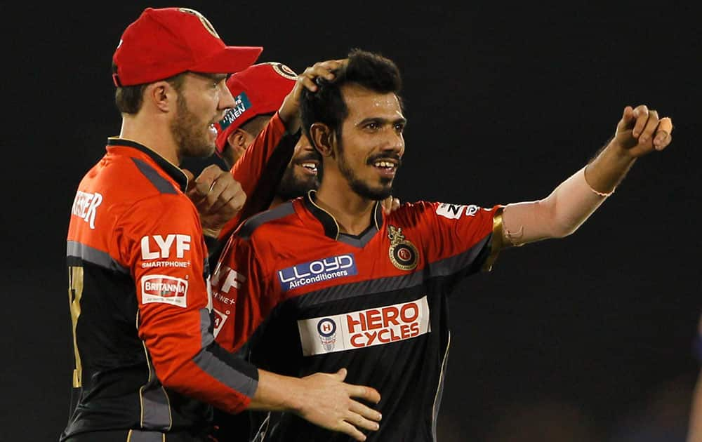 Yuzvendra Chahal of Royal Challengers Bangalore celebrates the wicket of Quinton de Kock of Delhi Daredevils during an IPL 2016 match in Raipur, Chhattisgarh.