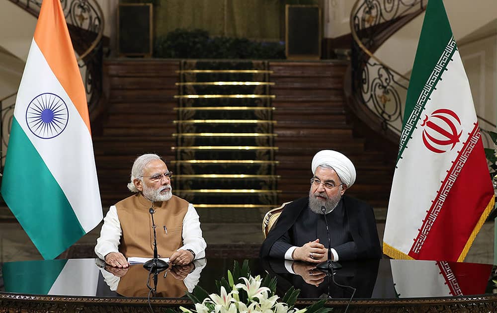 Iranian President Hassan Rouhani speaks with media during a joint press conference with Indian Prime Minister Narendra Modi at the Saadabad Palace in Tehran, Iran.