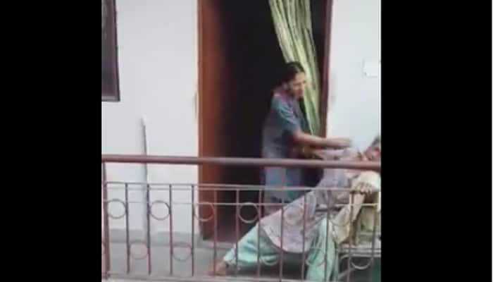 SHOCKING! This will make your blood boil! Elderly lady thrashed by woman, cries helplessly - WATCH