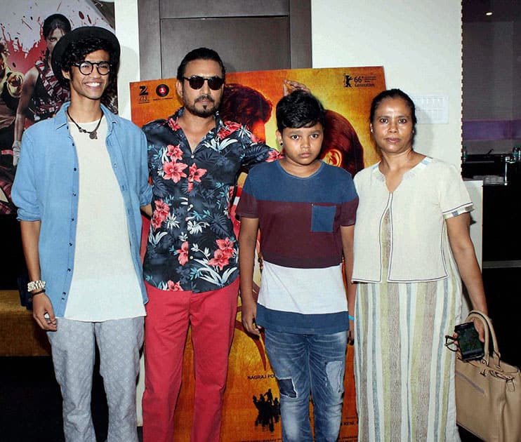 Irrfan Khan with his family during the special screening of Marathi film Sairat, in Mumbai.