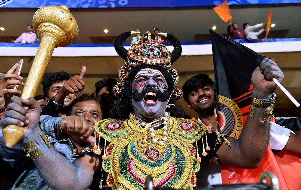 An RCB fan cheers up before the start of the IPL 2016 first qualifier between Royal Challengers Bangalore and Gujarat Lions at Chinnaswamy Stadium in Bengaluru.